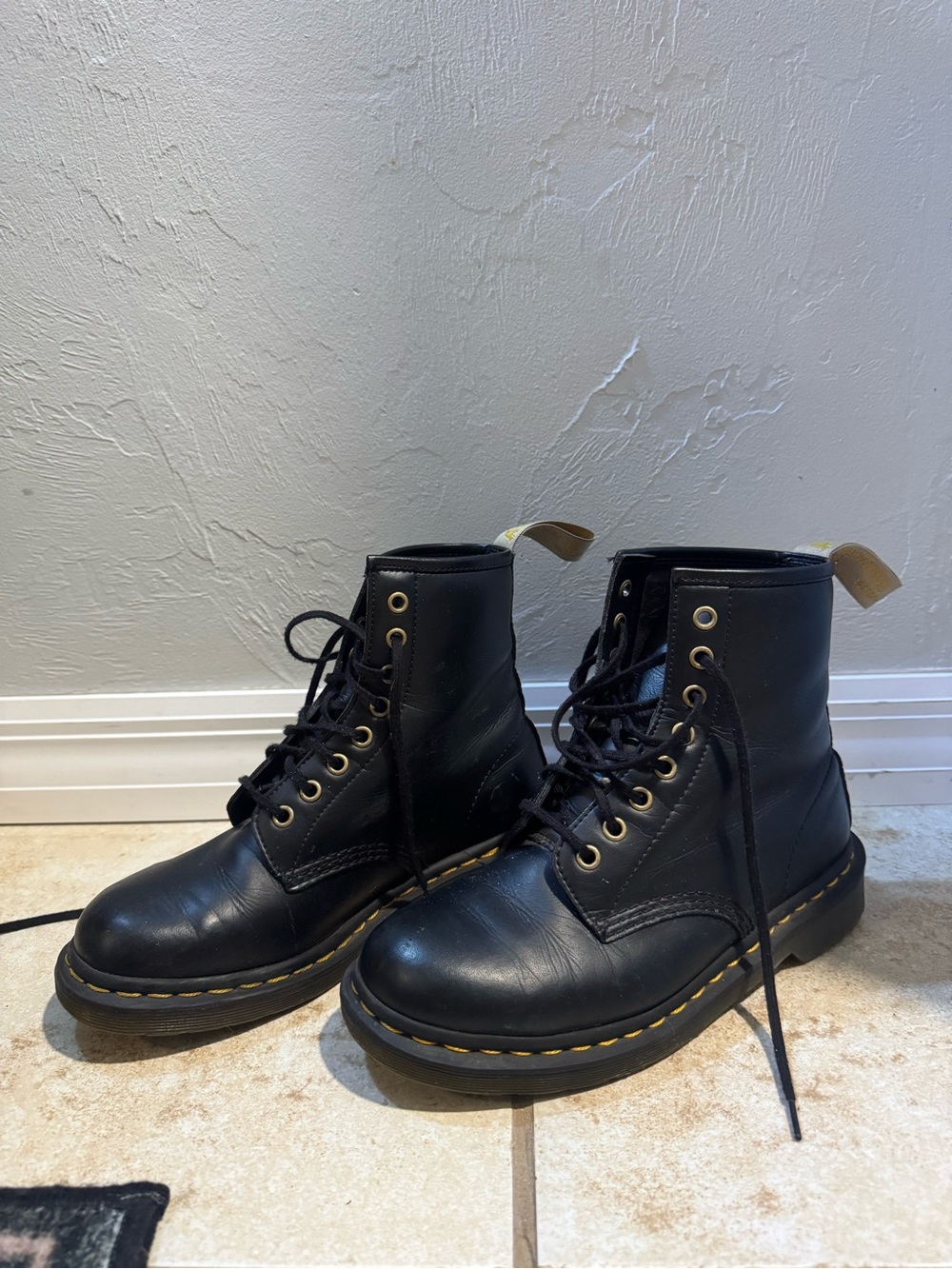 Dr. Martens Black Leather Combat Boots with Yellow Stitching